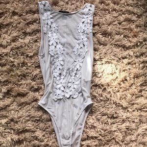 Pretty sheer form fitting body suit